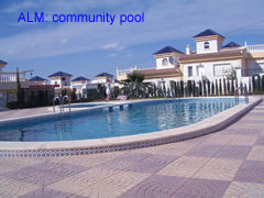 ALM 037 community swimming pool of this 2 bedroom villa at la marquesa golf course, ciudad quesada, costa blanca, spain 