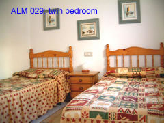 ALM 029 twin bedroom of this two bedroom villa at la marquesa golf course, ciudad quesada, costa blanca, spain 