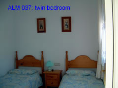 ALM 037 twin bedroom of this two bedroom villa at la marquesa golf course, ciudad quesada, costa blanca, spain