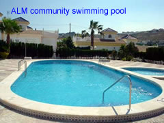 ALM 085 community swimming pool of this 1 bedroom villa at la marquesa golf course, ciudad quesada, costa blanca, spain 