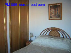 PM 086 master bedroom of this 2 bedroom villa near la marquesa golf course, ciudad quesada, costa blanca, spain