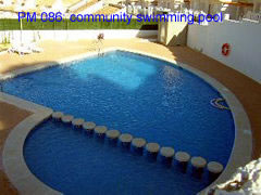 PM 086 community swimming pool of this 2 bedroom villa near la marquesa golf course, ciudad quesada, costa blanca, spain